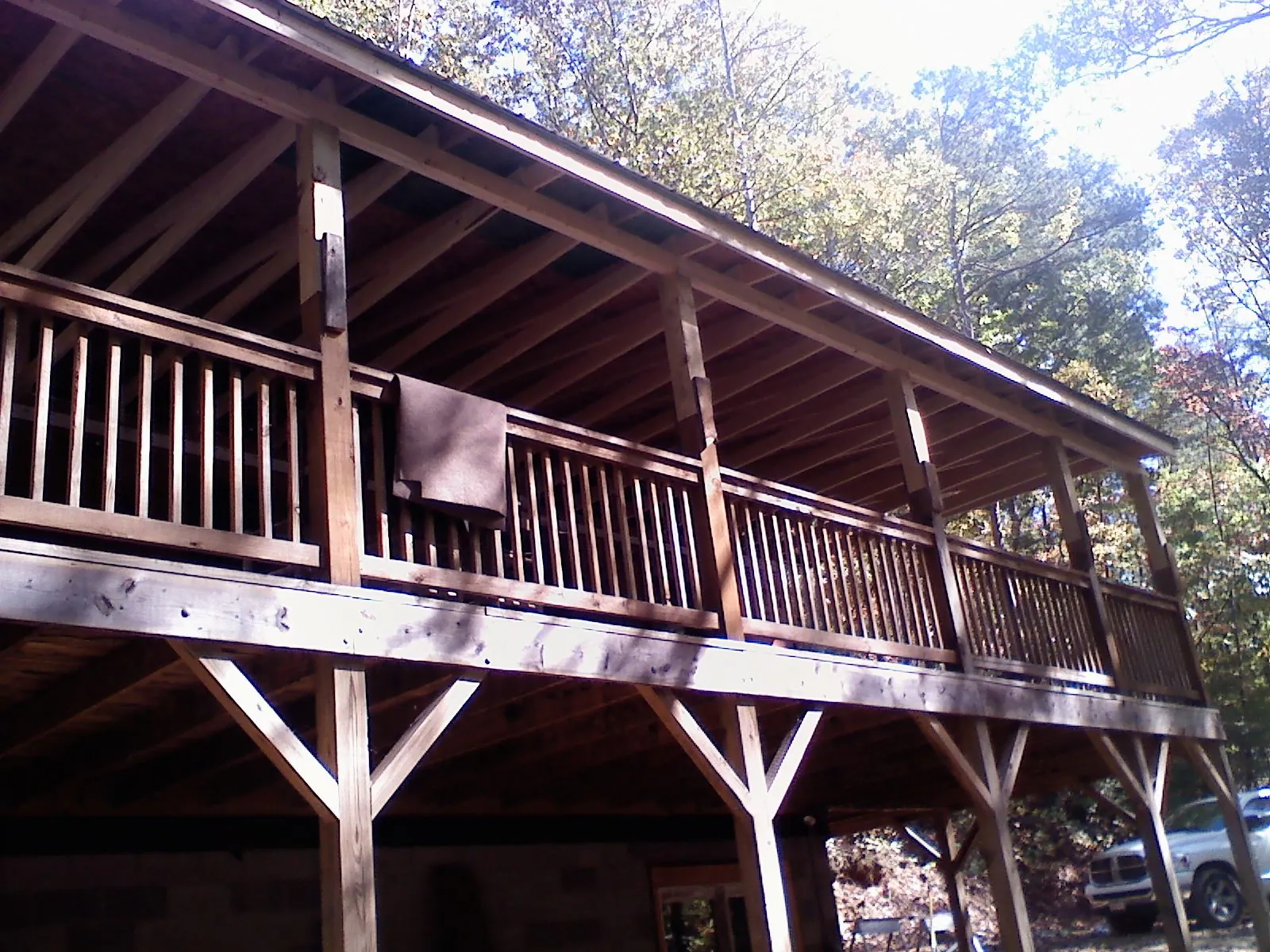 Timber framing under a new elevated porch and deck — Roof Leak Repair in Olney by Roofing Brothers